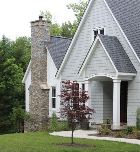 grey metal roof on grey house|grey houses with black shutters.